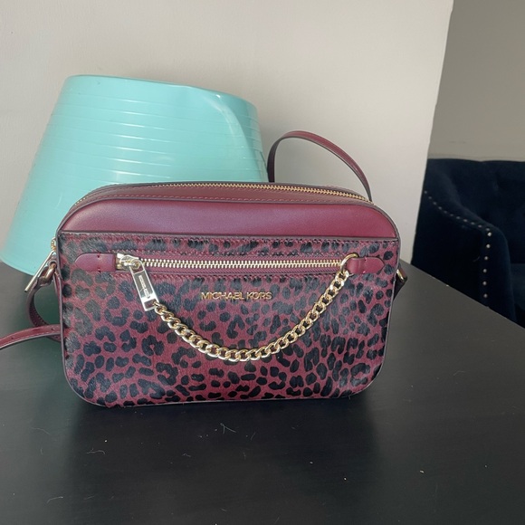 Michael Kors Handbags - Michael Kors Jet set Oxblood Leopard cowhide, zip chain Crossbody Bag